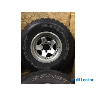 [BS DUELER M/T LT285/75R16] 4 spiked tires [BERG outside 16 inches 8J6HPCD139.7-10] Bali groove Lank