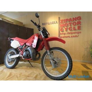 HONDA CRM250R Red 21.611 km. 250cc Motocross 2 stroke production early model bike