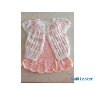 Handmade knitted baby waistcoat and skirt