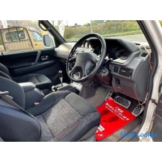 Pajero Evolution genuine RECARO seat/genuine aluminum/external muffler/wide door visor/carbon panel/