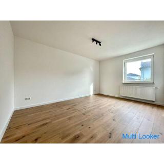 Newly renovated 3-room apartment with balcony and outdoor parking space