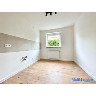 Newly renovated 3-room apartment with balcony and outdoor parking space