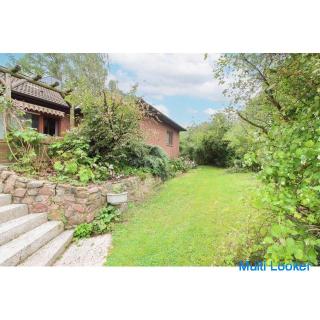 Bungalow met zeven kamers, volledig onderkelderd, terras op het zuiden en tuin in Eimbeckhausen